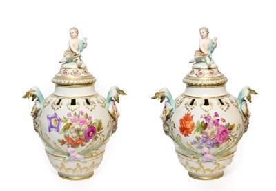 Lot 96 - A Pair of Berlin Porcelain Vases and Covers, late 19th century, of ovoid form with mask handles and