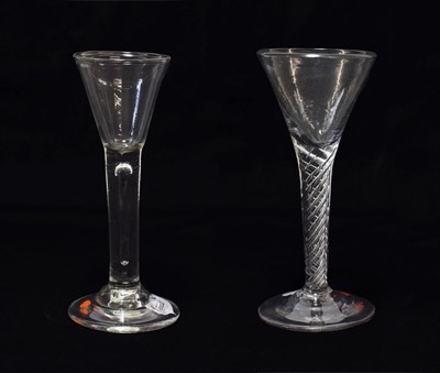 Lot 106 - A Wine Glass, circa 1750, the drawn conical bowl on plain stem with elongated air tear and...