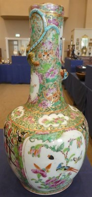 Lot 116 - A Pair of Cantonese Porcelain Bottle Vases, mid 19th century, of ovoid form, the cylindrical...