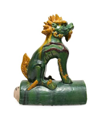 Lot 123 - A Chinese Sancai Glazed Ridge Tile, in Ming style, modelled as a seated kylin, 33cm high