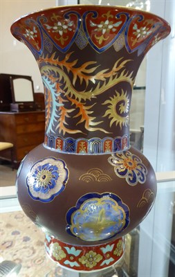 Lot 130 - A Japanese Porcelain Vase, Meiji period, of ovoid form with trumpet neck, painted in imitation...