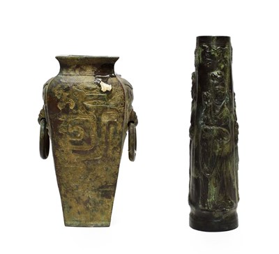 Lot 139 - A Chinese Bronze Vase, in Archaic style, of square section baluster form with mask handles,...