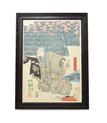 Lot 140 - Utagawa Kuniyoshi (1797-1861): Woodblock print, depicting a kneeling man holding a bird in an...