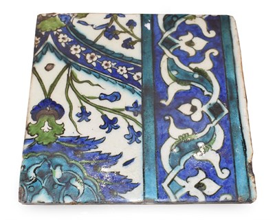 Lot 141 - A Damascus Pottery Border Tile, circa 1580, painted in blue, green and turquoise with stylised...