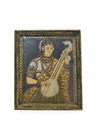 Lot 144 - Indian School (19th century) Half-length portrait of a youth playing a sitar Watercolour and relief