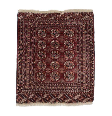 Lot 176 - Tekke Rug Emirate of Bukhara, circa 1910 The madder field with columns of quartered güls framed by