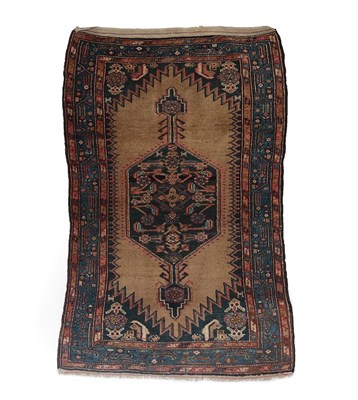 Lot 177 - Sarab Rug North West Iran, circa 1920 The plain camel ground centred by a medallion framed by...