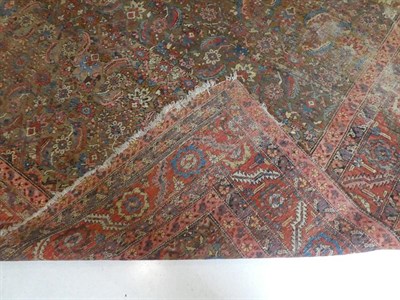 Lot 187 - Bakshaish Carpet North West Iran, circa 1880 The walnut brown Herati field enclosed by brick...