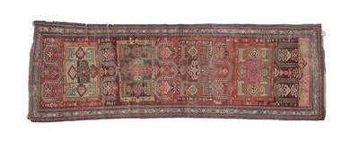 Lot 190 - Karabagh Runner  South Caucasus, circa 1900 The abrashed terracotta field with tribal devices...