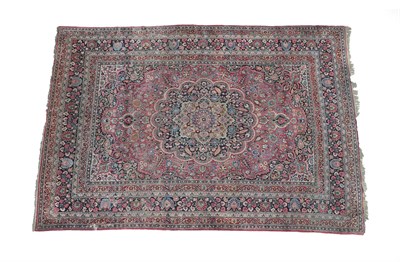 Lot 196 - Mashad Carpet North East Iran, circa 1920 The raspberry field of vines around a cusped...