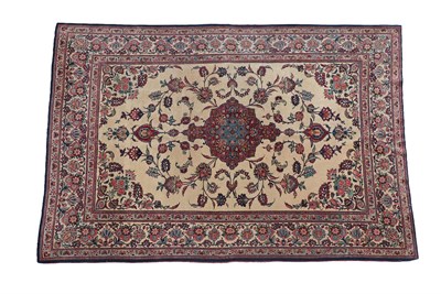 Lot 199 - Kashan Carpet Central Iran, circa 1940 The cream field of flowering vines around a raspberry...