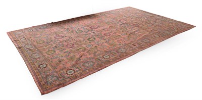 Lot 203 - Donegal Carpet Killibegs, West Ireland, circa 1900 The salmon pink field of flowing vines,...