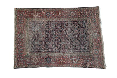 Lot 206 - Feraghan Rug West Iran, circa 1900 The indigo Herati field enclosed by terracotta borders of...