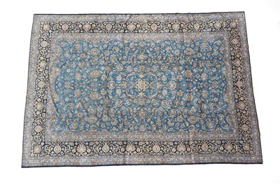 Lot 215 - Kashan Carpet Central Iran, circa 1965 The mid indigo field of vines enclosed by deep indigo...