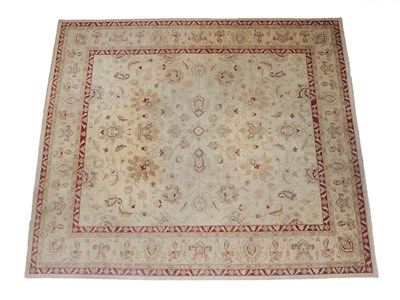 Lot 221 - Modern Ziegler Design Carpet of unusual size The cream field with an all over design of flower...