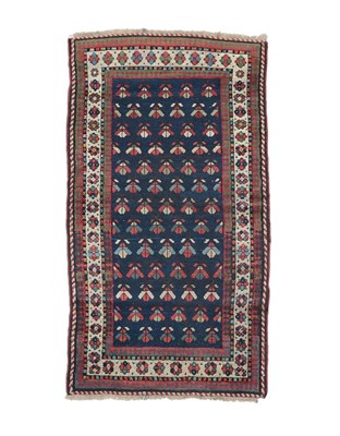 Lot 222 - Talish Rug South East Caucasus, circa 1880 The deep indigo field with rows of stylised flowers...