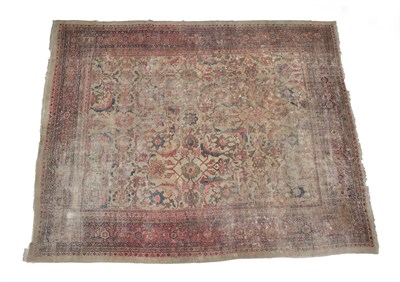 Lot 223 - Mahal Carpet West Iran, circa 1900 The ivory field with an allover design of large flowerheads...