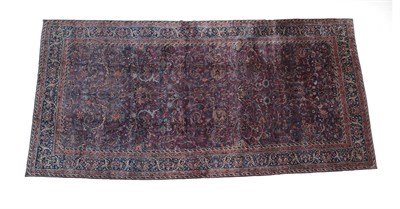 Lot 224 - Unusual Carpet, probably Saroukh or Kashan, circa 1930 The deep aubergine field of large...