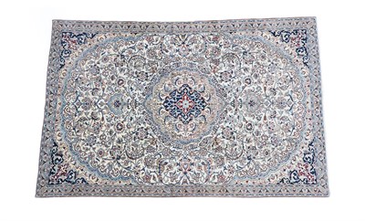 Lot 229 - Nain Carpet Central Iran, circa 1970 The field of floral vines around a cusped medallion framed...