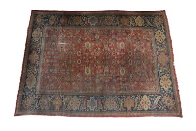 Lot 233 - Large Ziegler Mahal Carpet West Iran, circa 1880 The terracotta field of angular vines enclosed...