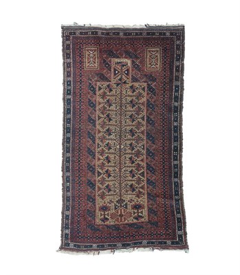 Lot 240 - Baluch Prayer Rug Afghan/Iranian Frontier, circa 1900 The natural camel field with stylised...