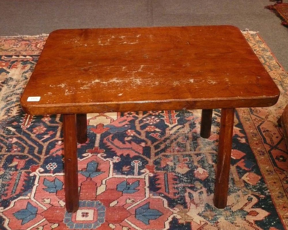 Lot 1555 - A Robert "Mouseman" Thompson Oak Pub Table, the adzed rectangular top on four tapering...