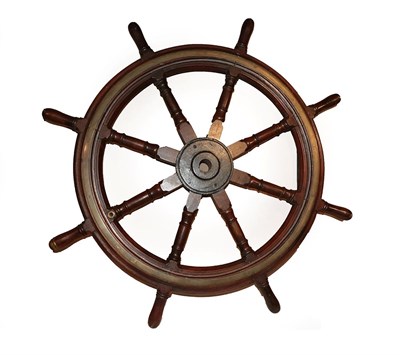 Lot 246 - A Brass Bound Mahogany Ship's Wheel, 19th century, with iron boss and eight baluster turned spokes