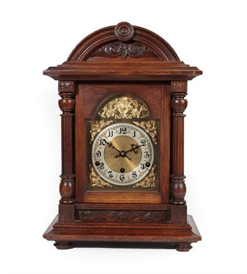 Lot 252 - An Oak Quarter Striking Table Clock, circa 1890, arch pediment, brass dial with a silvered...