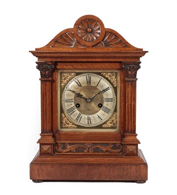 Lot 253 - A Walnut Quarter Striking Mantel Clock, circa 1890, arched pediment, brass dial with a silvered...