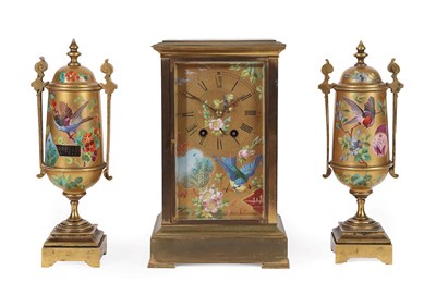 Lot 254 - A Brass Porcelain Panelled Striking Mantel Clock Garniture, circa 1890, dial and side porcelain...