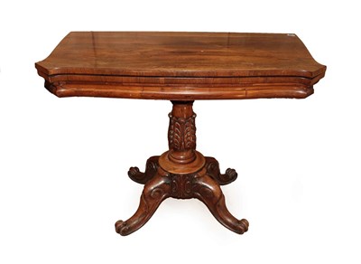 Lot 259 - A Victorian Carved Rosewood Foldover Card Table, mid 19th century, of serpentine shaped form,...