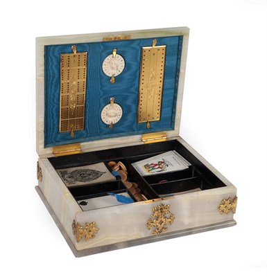 Lot 275 - A Gilt Metal Mounted Onyx Games Box, circa 1870, of rectangular form applied with a monogram...