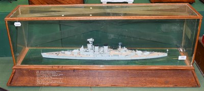 Lot 292 - A Scale Model of HMS Hood, in a glazed oak display cabinet, 100cm wide overall