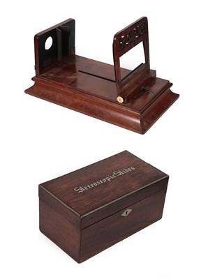 Lot 321 - A Negretti & Zambra Mahogany Stereoscopic Viewer, the cardholder with foliate fret piercing, on...