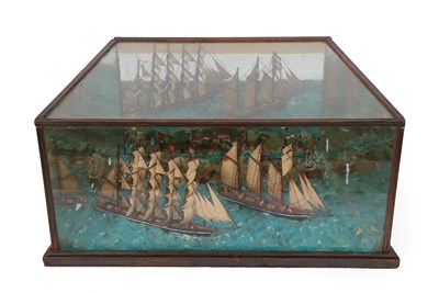 Lot 330 - A Ship Diorama, 19th century, modelled with two sailing ships on a choppy sea, an island with...