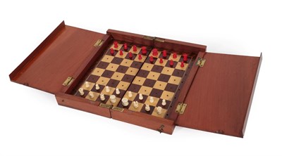 Lot 337 - A Late Victorian Mahogany Cased Travelling Chess Set, of folding rectangular form, the interior...