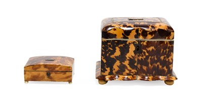 Lot 365 - A Regency Tortoiseshell Tea Caddy, of serpentine fronted rectangular form, the hinged cover...