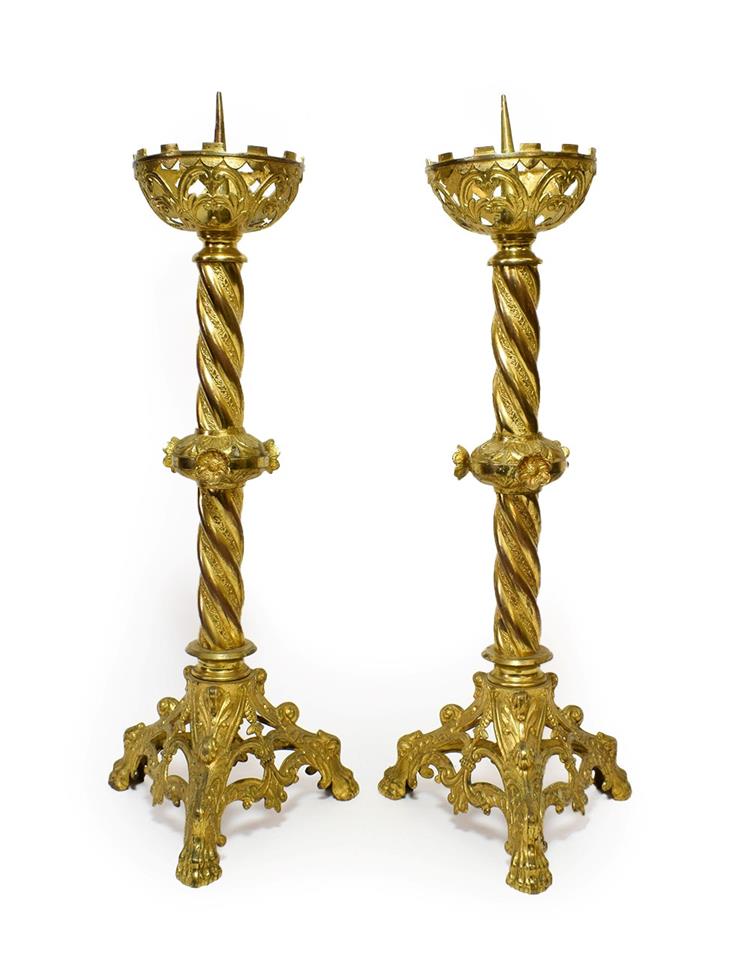 Lot 381 A Pair of NeoGothic Gilt Metal Candlesticks,