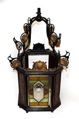 Lot 382 - A Black and Gold Painted Hall Lantern, 19th century, of canted rectangular form with scroll...