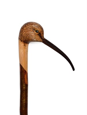 Lot 402 - An Ian Taylor Curlew Walking Cane, the handle naturalistically carved and decorated as the...