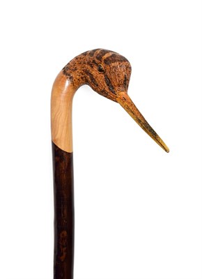 Lot 406 - An Ian Taylor Woodcock Walking Cane, the handle naturalistically carved and decorated as the...