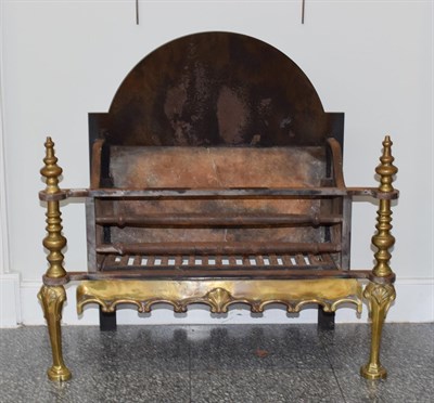 Lot 415 - A Brass and Steel Fire Grate, with arched back and minaret finials on cabriole legs, 73cm wide