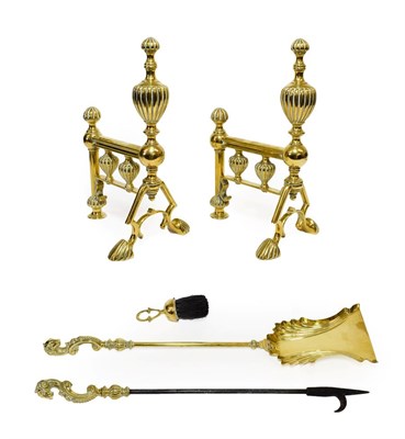 Lot 417 - A Pair of Victorian Brass Andirons, with fluted urn finials and balusters on paw feet, 35cm high; A