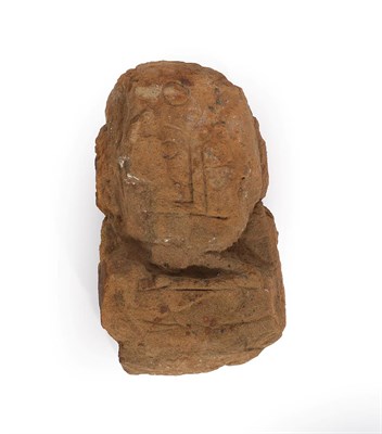 Lot 420 - A Carved Sandstone Head, possibly Celtic, of stylised form, 43cm high