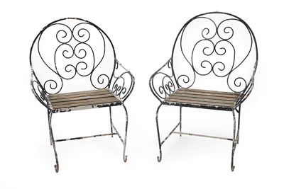 Lot 424 - A Pair of Mid 20th Century French Wrought Iron Garden Seats, with scrolled back support and...