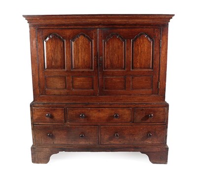 Lot 435 - A Mid 18th Century Oak and Mahogany Crossbanded Livery Housekeeper's Cupboard, the moulded...