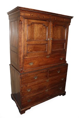 Lot 438 - A Joined Oak Secretaire Cabinet, 2nd quarter 18th century, the Greek Key cornice above a...