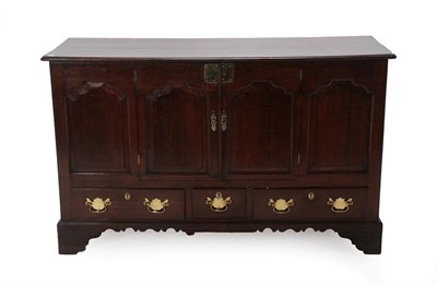 Lot 442 - A George III Oak Mule Chest, late 18th century and adapted, the boarded top above four fielded...