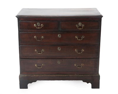 Lot 450 - A George II Oak Straight Front Chest of Drawers, the moulded top above two short and three long...