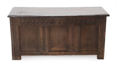 Lot 452 - A Late 17th Century Joined Oak Chest, the hinged lid above a guilloche carved frieze with...